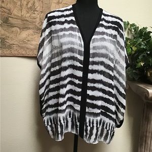 FRENCH BSUE, size medium, poncho like sheer blouse in black and white